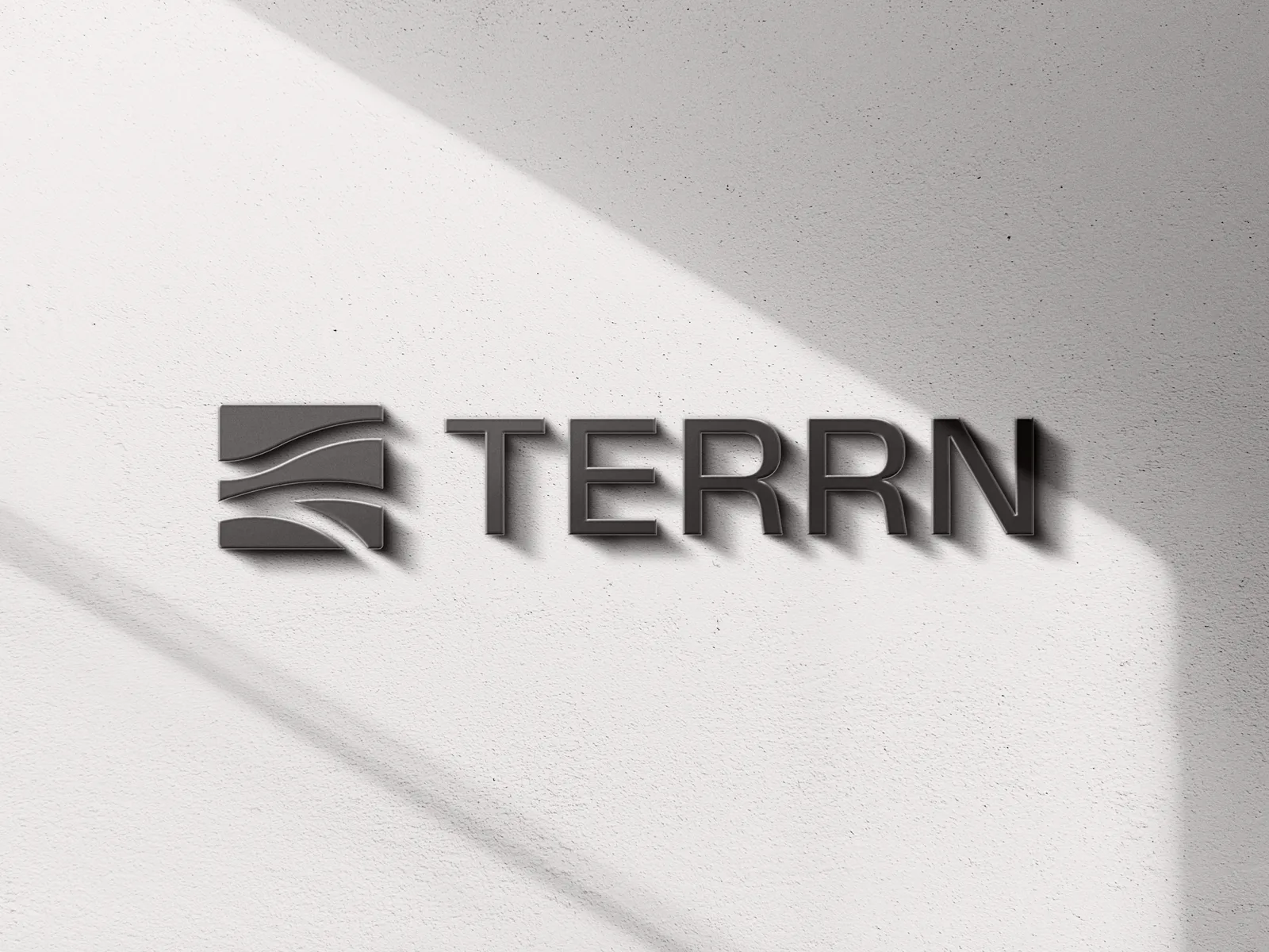 TERRN signage installed on a stone wall